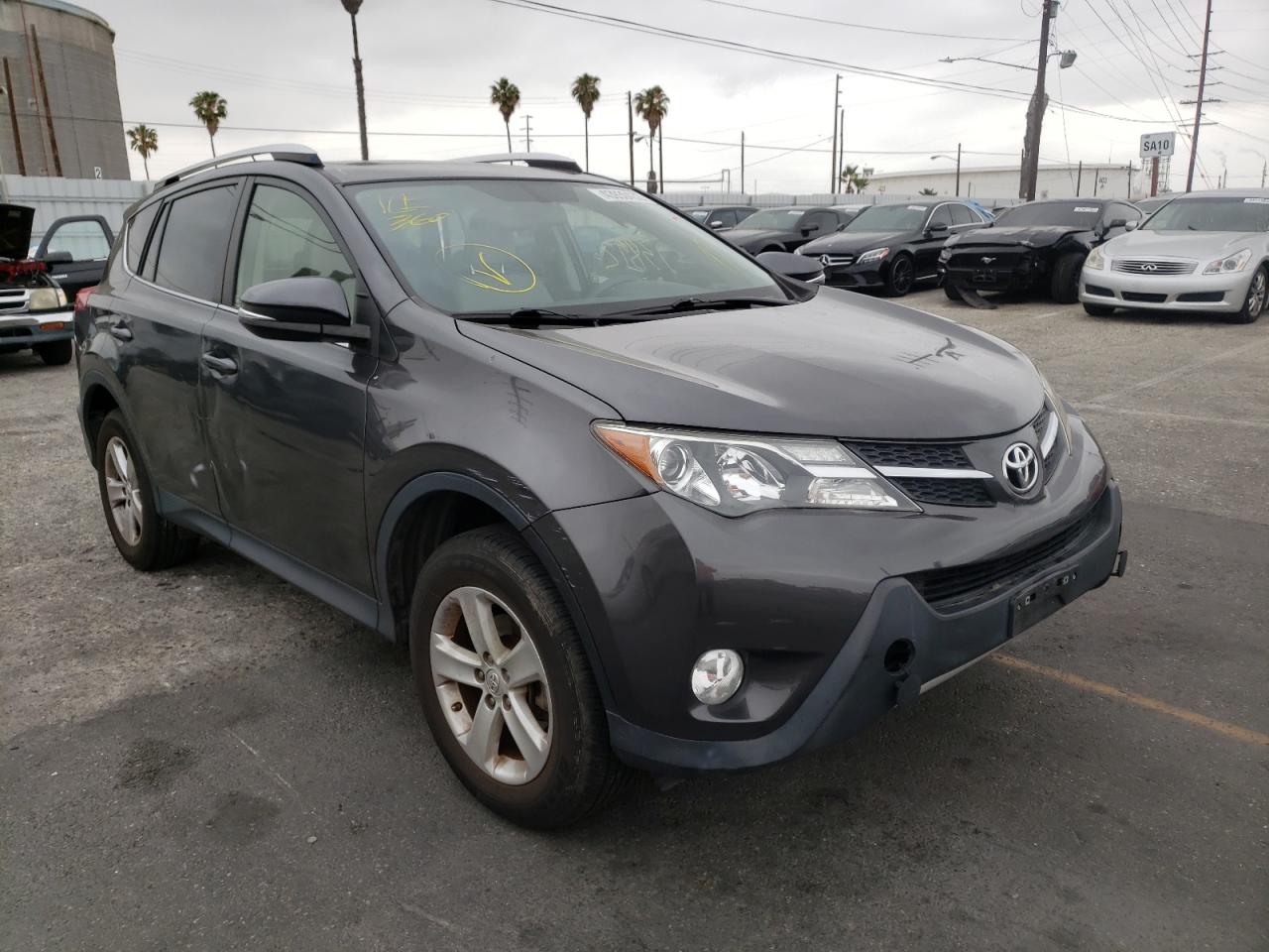 TOYOTA RAV4 XLE 2014 with VIN JTMWFREVXEJ009209 - Photo from auction