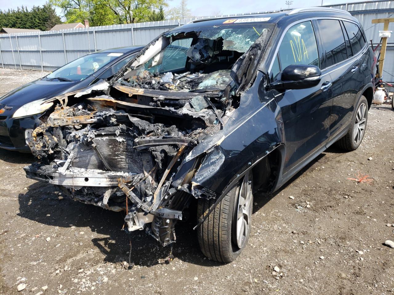 Photo 2 from auction – 2018 HONDA PILOT ELIT with VIN 5FNYF6H08JB044548
