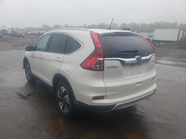 Photo 2 from auction – 2016 HONDA CR-V TOURI with VIN 5J6RM4H90GL093983