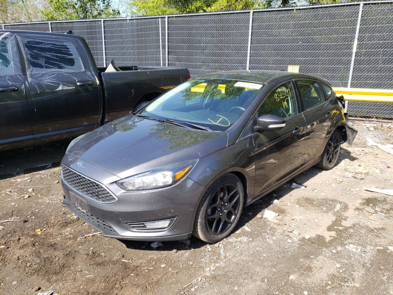 Photo 14 from auction – 2016 FORD FOCUS SE with VIN 1FADP3K29GL288032