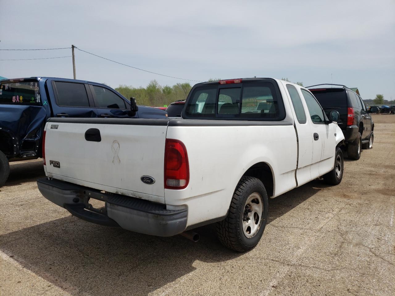 Photo 4 from auction – 2004 FORD F-150 HERI with VIN 2FTRX17204CA39654