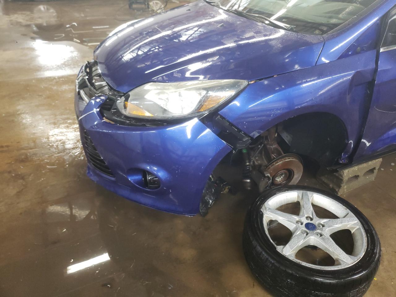 Photo 9 from auction – 2012 FORD FOCUS TITA with VIN 1FAHP3N28CL277465