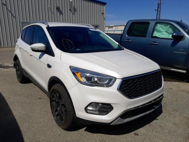 FORD ESCAPE TIT 2017 with VIN 1FMCU0J96HUC67741 - Photo from auction