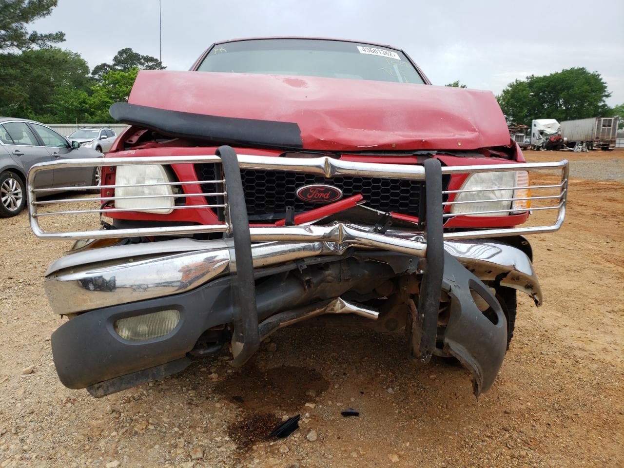 Photo 9 from auction – 2000 FORD F150 with VIN 1FTRX18L6YNA71628