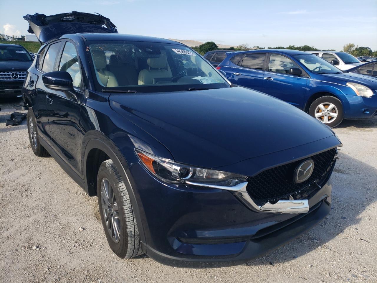 MAZDA CX-5 TOURI 2019 with VIN JM3KFACM7K0617708 - Photo from auction