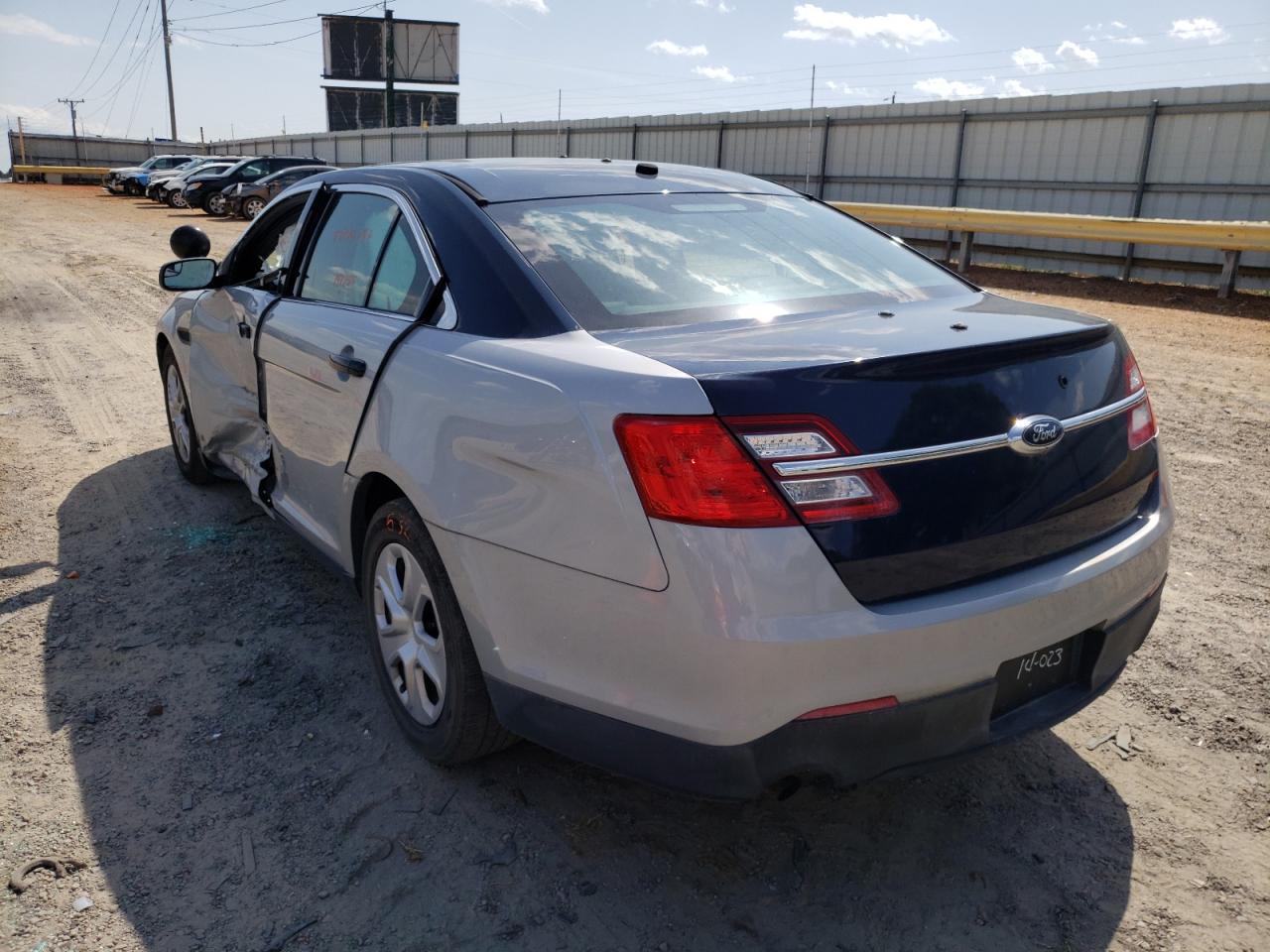 Photo 3 from auction – 2014 FORD TAURUS POL with VIN 1FAHP2MK4EG153703