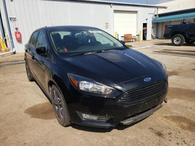 FORD FOCUS SE 2018 with VIN 1FADP3FE1JL224420 - Photo from auction