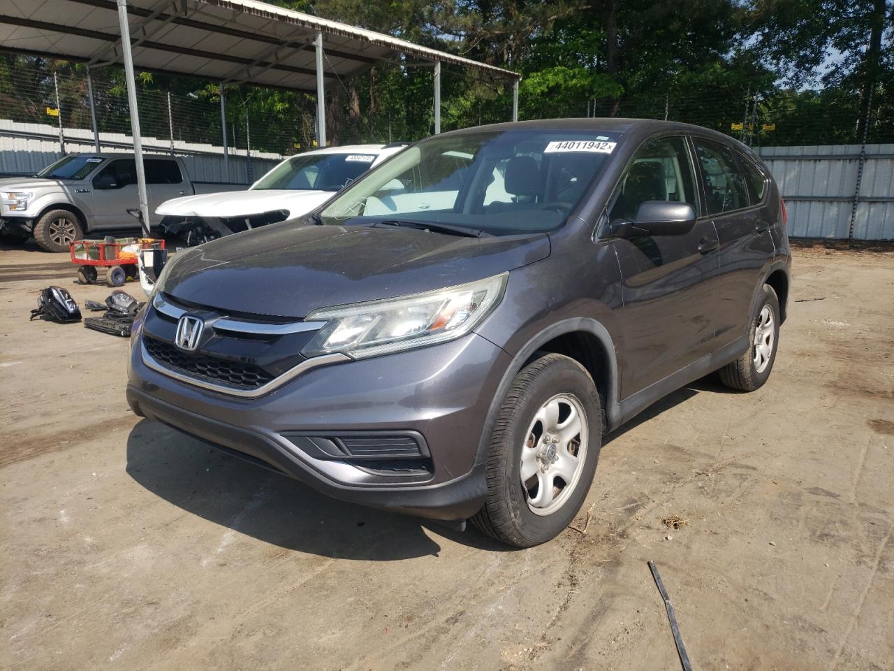 Photo 2 from auction – 2015 HONDA CR-V LX with VIN 3CZRM3H31FG708848