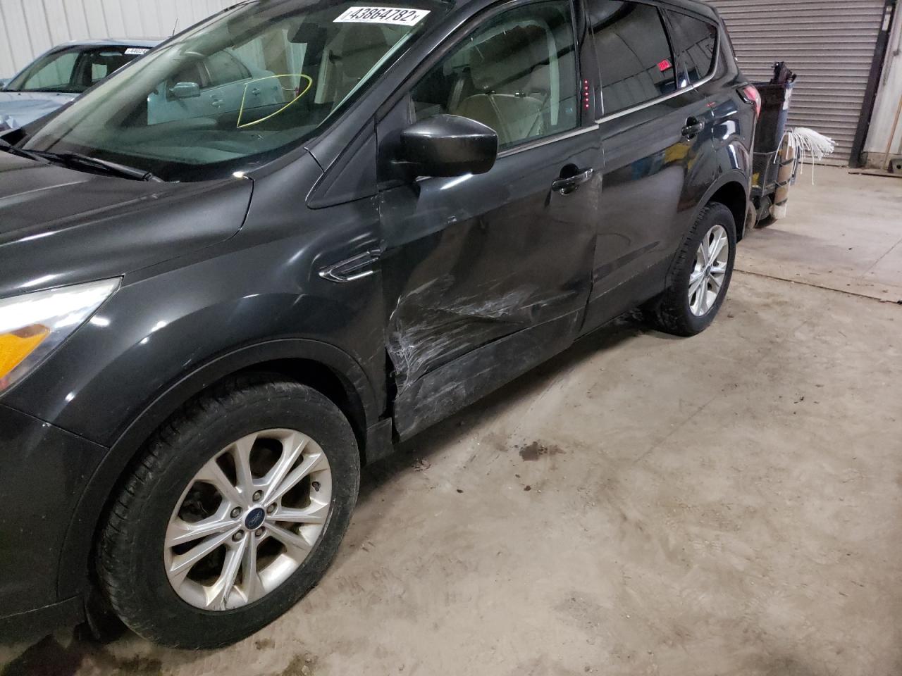Photo 9 from auction – 2017 FORD ESCAPE SE with VIN 1FMCU9GD6HUD55611