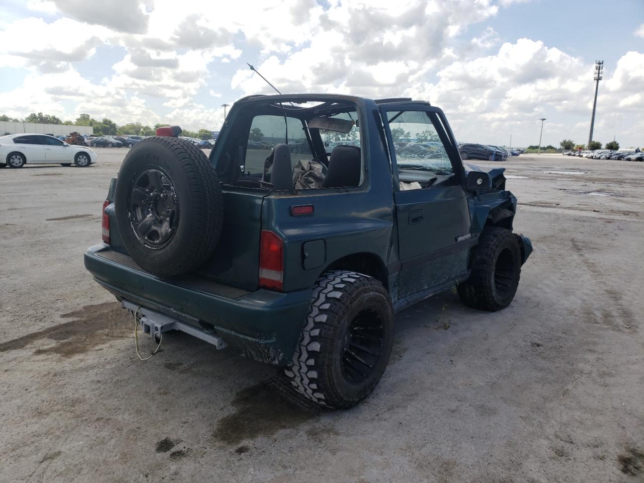 Photo 4 from auction – 1996 GEO TRACKER with VIN 2CNBJ1868T6943703