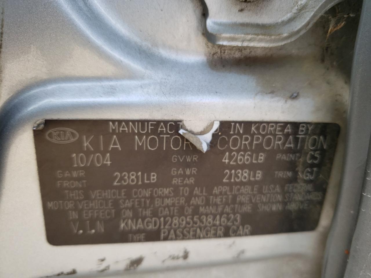 Photo 10 from auction – 2005 KIA OPTIMA LX with VIN KNAGD128955384623