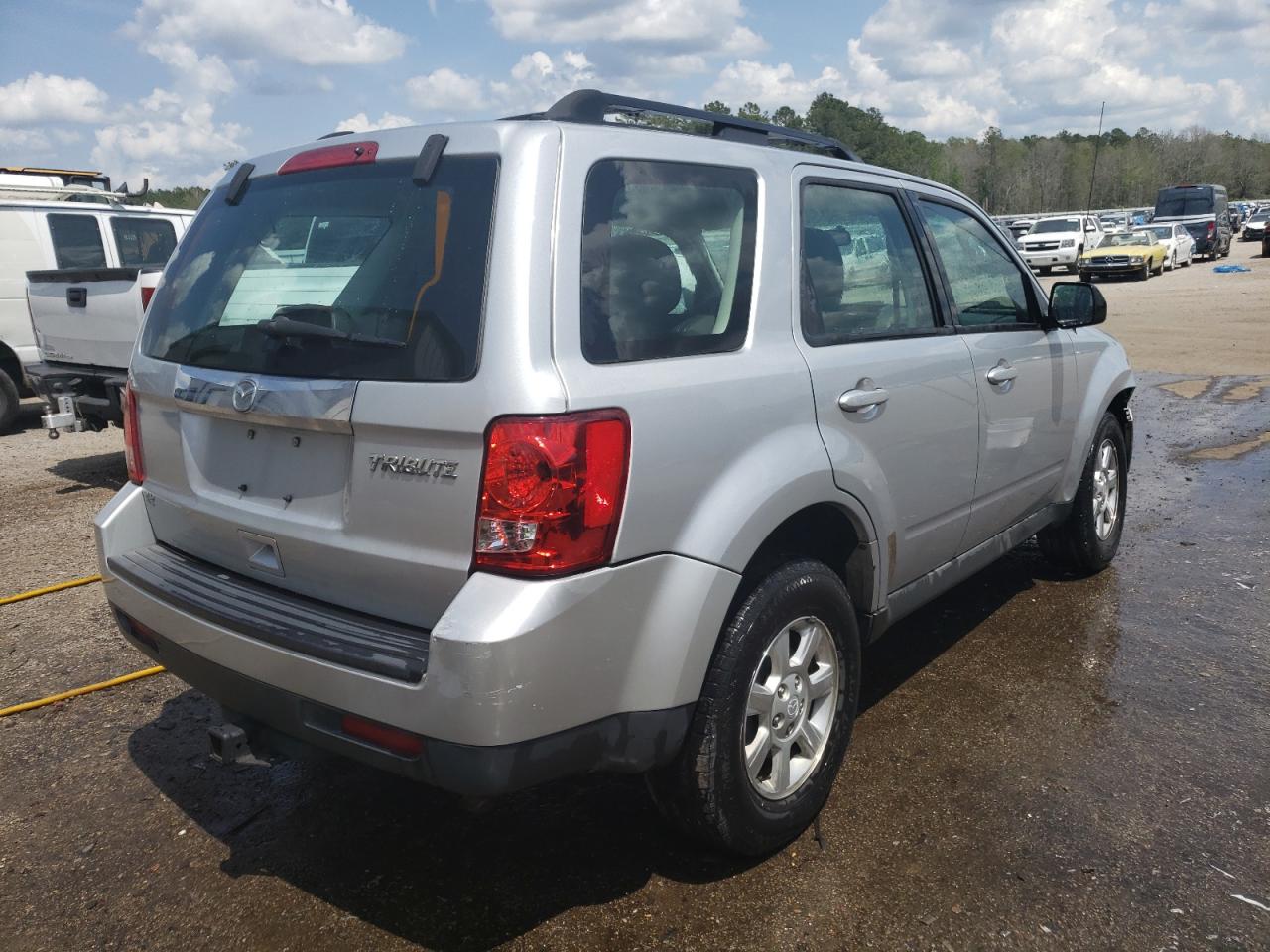 Photo 4 from auction – 2010 MAZDA TRIBUTE I with VIN 4F2CY0C75AKM02634