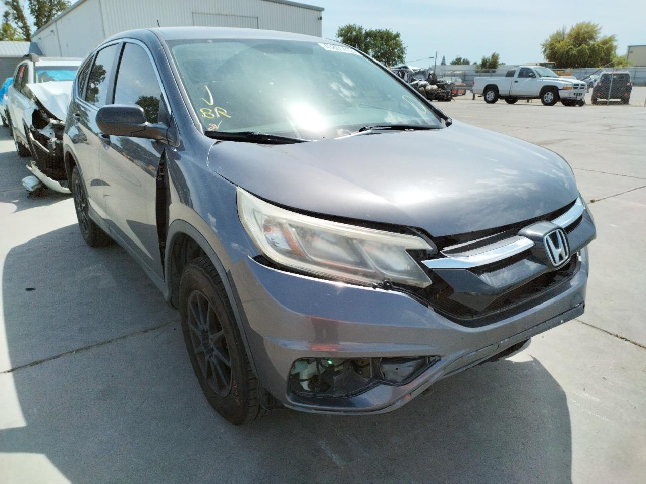 HONDA CR-V LX 2015 with VIN 3CZRM3H32FG716103 - Photo from auction