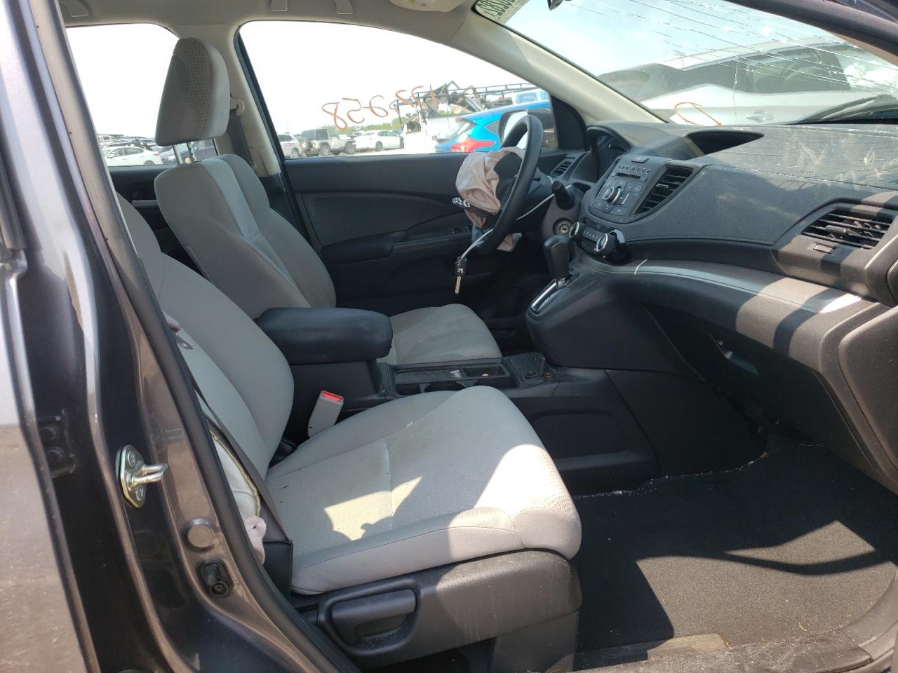 Photo 5 from auction – 2016 HONDA CR-V LX with VIN 2HKRM3H30GH540828