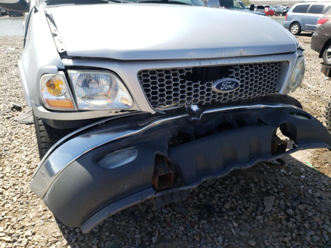 Photo 9 from auction – 1999 FORD F150 with VIN 1FTRX18W3XKA04804