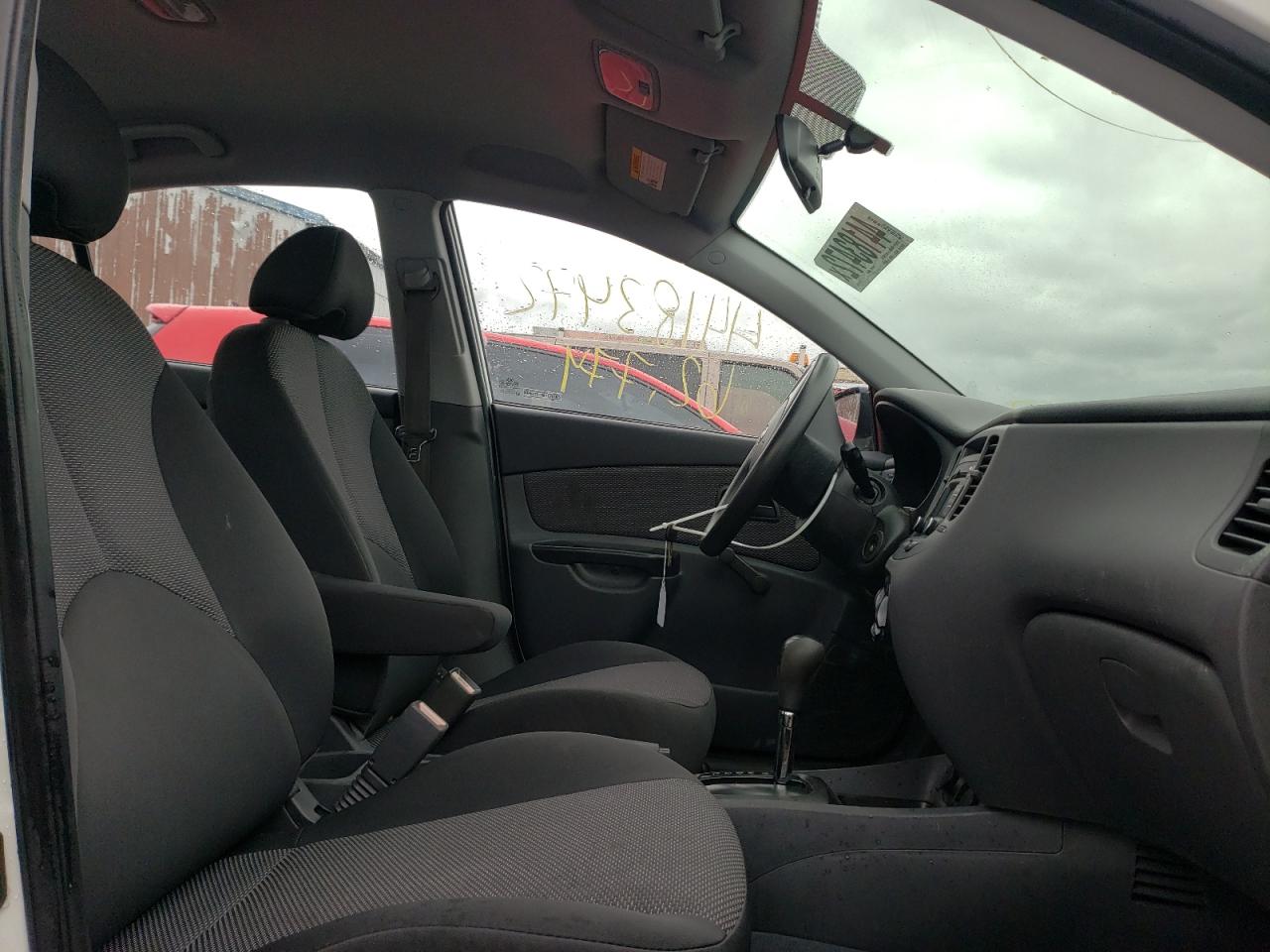 Photo 5 from auction – 2011 KIA RIO BASE with VIN KNADH4A38B6948458