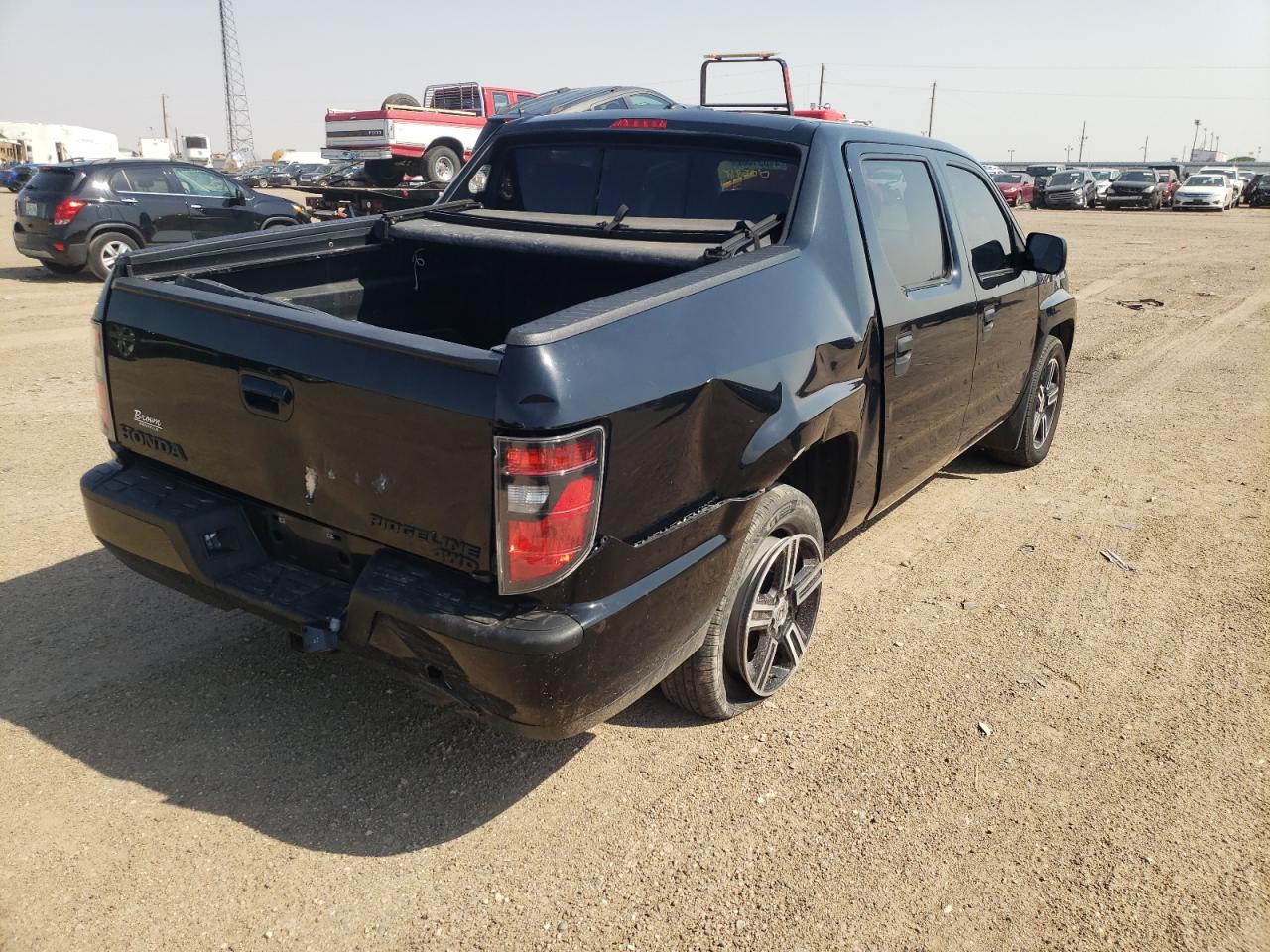 Photo 4 from auction – 2013 HONDA RIDGELINE with VIN 5FPYK1F74DB005918