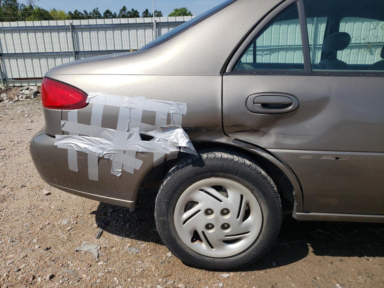 Photo 9 from auction – 2001 FORD ESCORT with VIN 3FAFP13P11R144930
