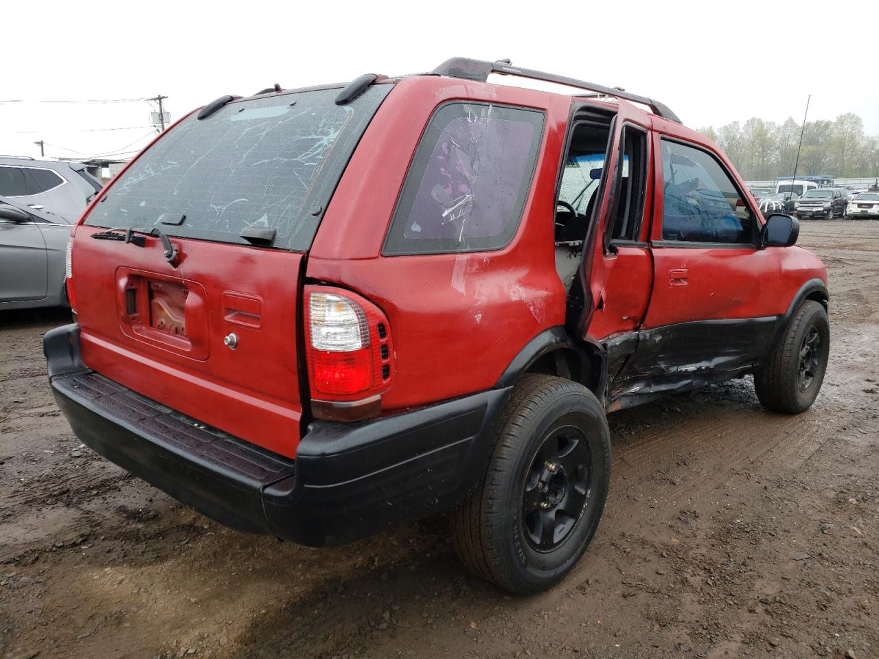 Photo 4 from auction – 1999 ISUZU RODEO S with VIN 4S2CM58W7X4318647