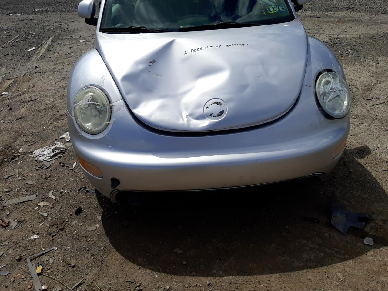 Photo 9 from auction – 2000 VOLKSWAGEN NEW BEETLE with VIN 3VWCC21C9YM404574