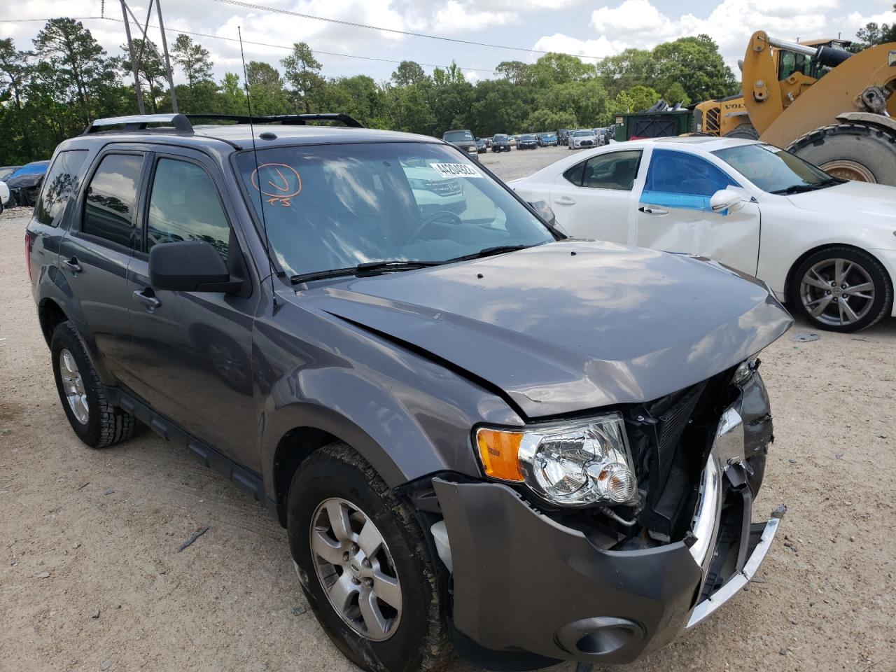 FORD ESCAPE LIM 2010 with VIN 1FMCU0EG4AKB77692 - Photo from auction