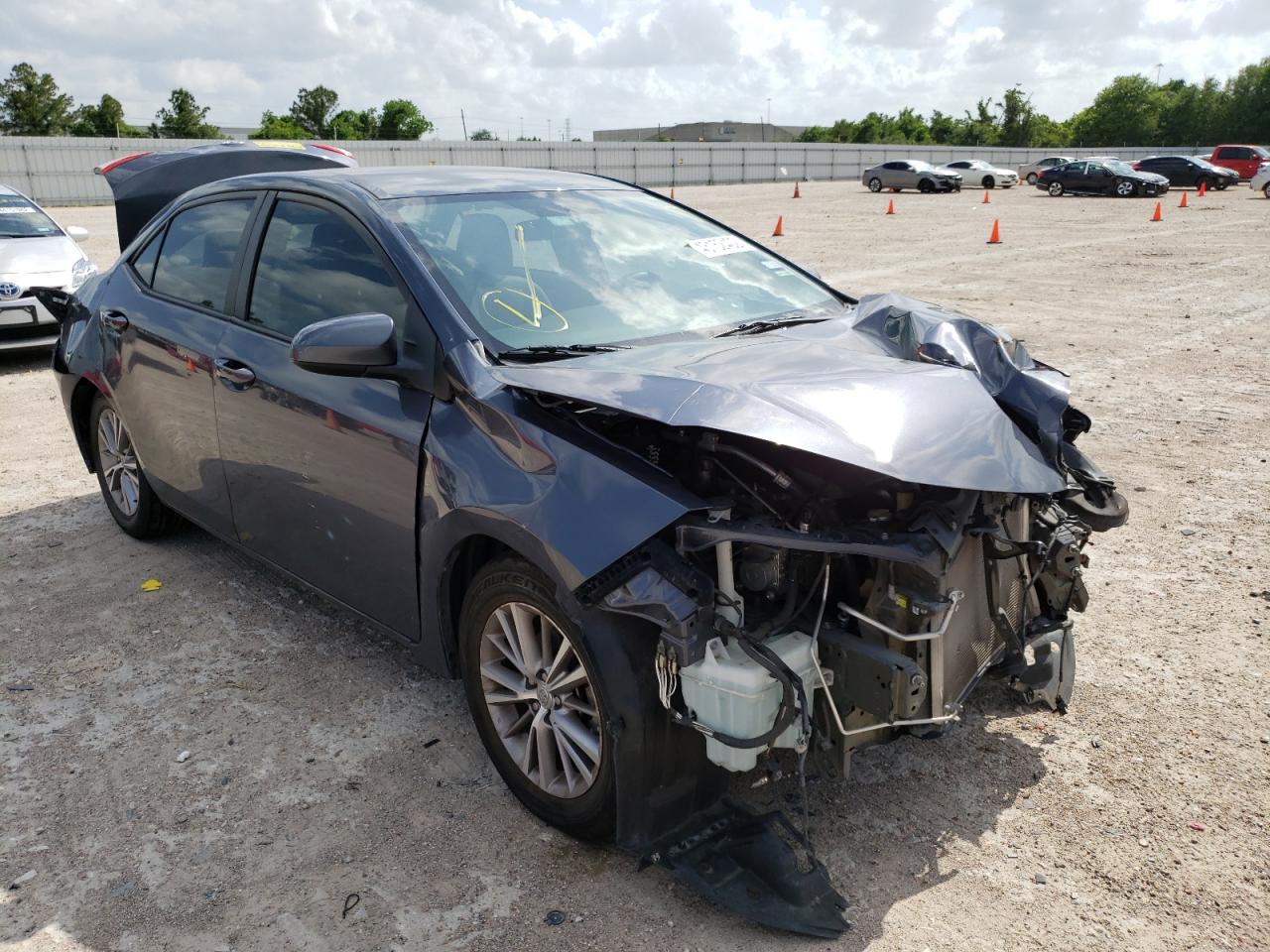 TOYOTA COROLLA L 2014 with VIN 5YFBURHE3EP019057 - Photo from auction