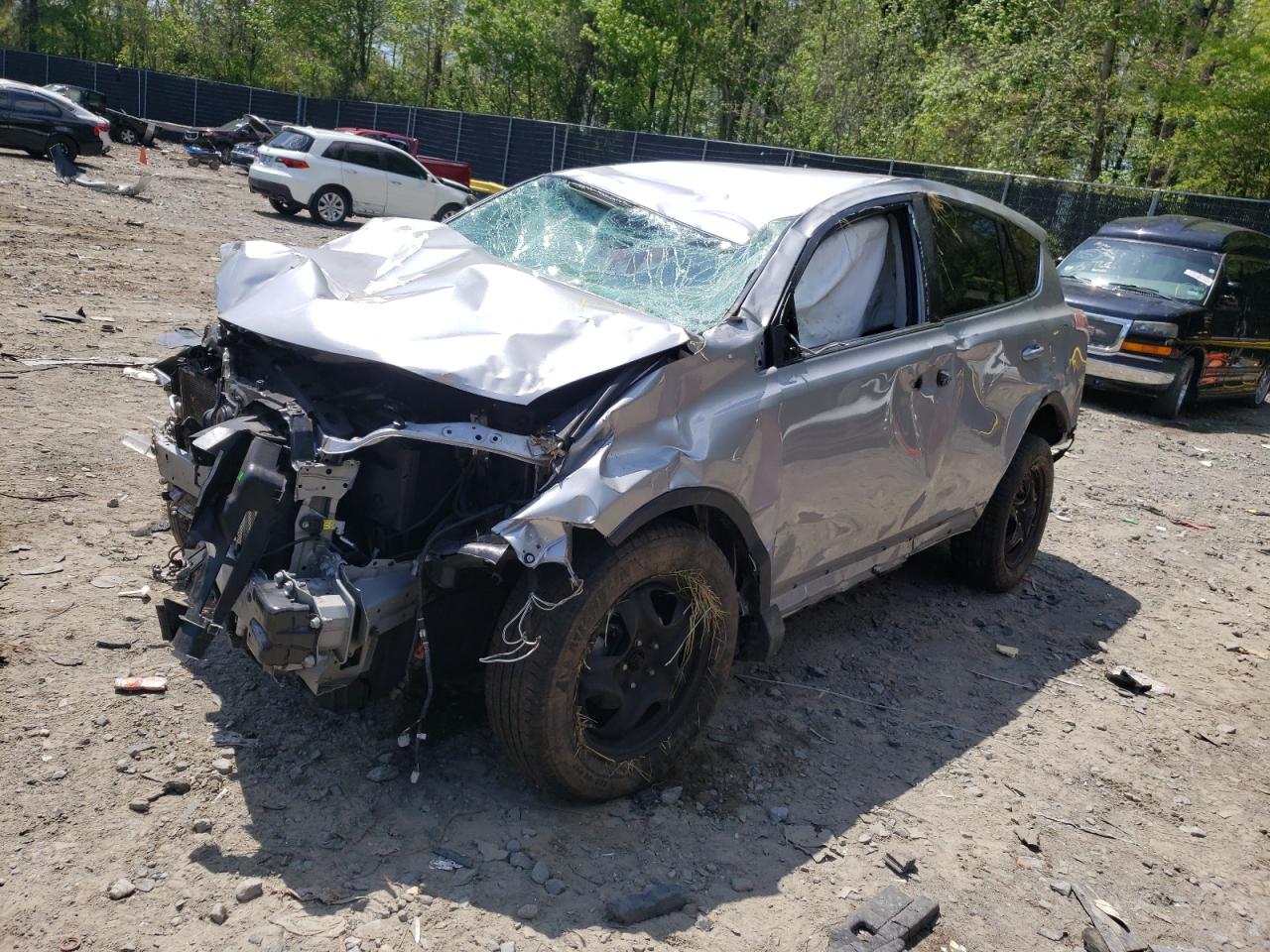 Photo 2 from auction – 2018 TOYOTA RAV4 LE with VIN 2T3ZFREV0JW509470
