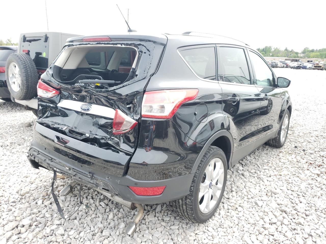 Photo 4 from auction – 2014 FORD ESCAPE TIT with VIN 1FMCU9J93EUD49524