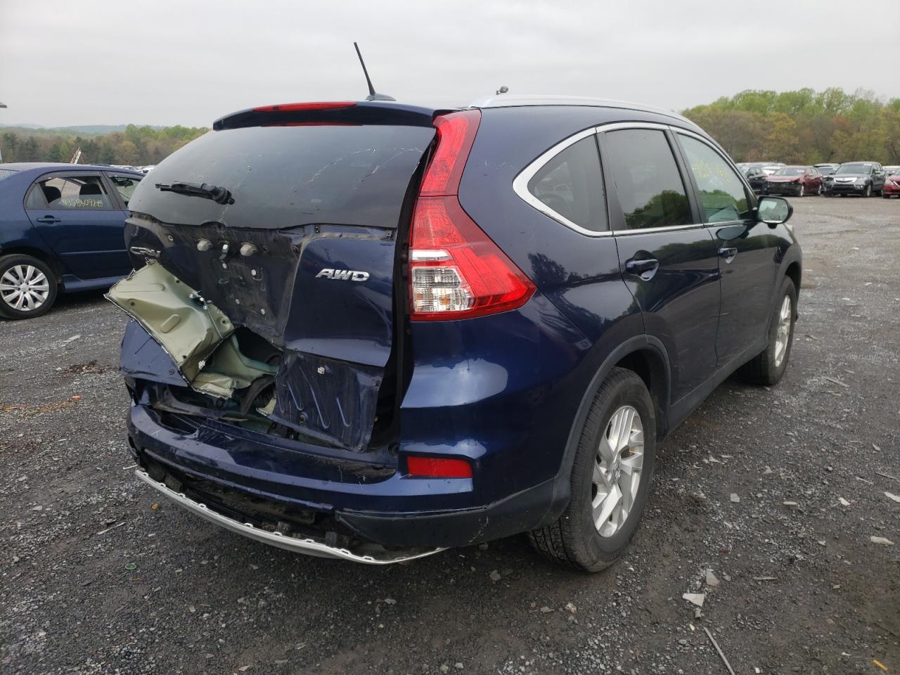 Photo 4 from auction – 2016 HONDA CR-V EXL with VIN 2HKRM4H75GH699305