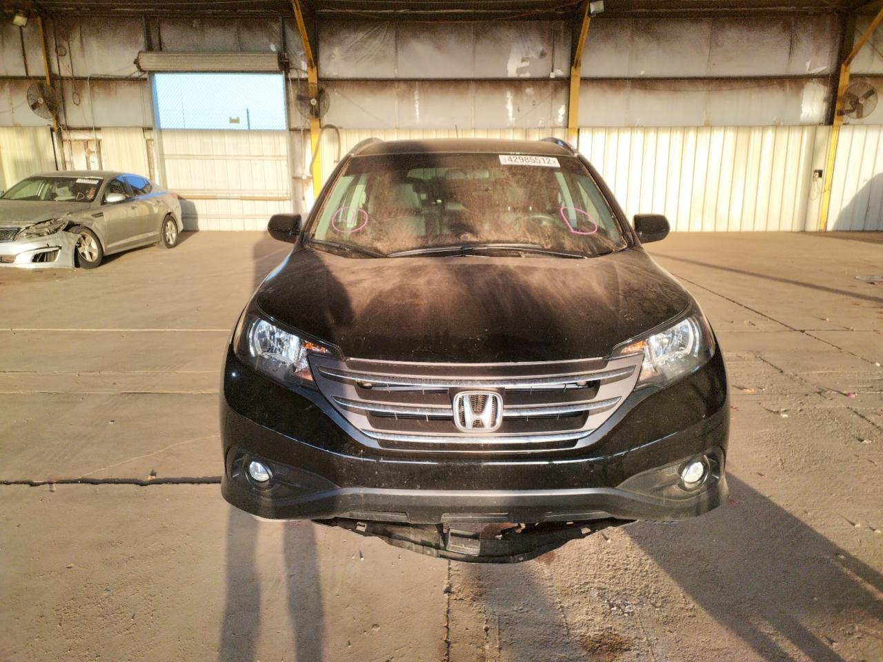 Photo 9 from auction – 2014 HONDA CR-V EXL with VIN 2HKRM3H72EH511587