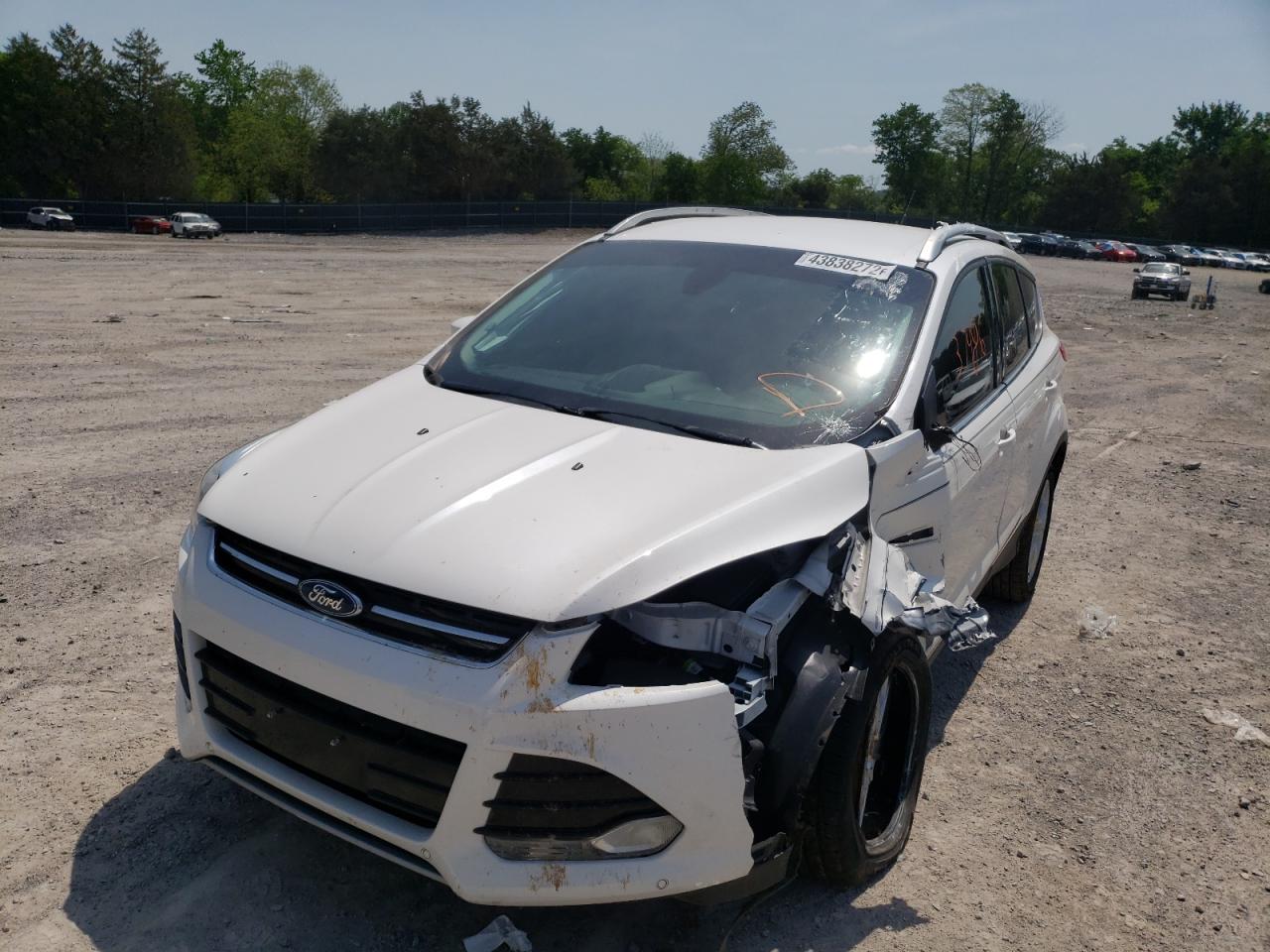 Photo 2 from auction – 2014 FORD ESCAPE TIT with VIN 1FMCU9J95EUA73637