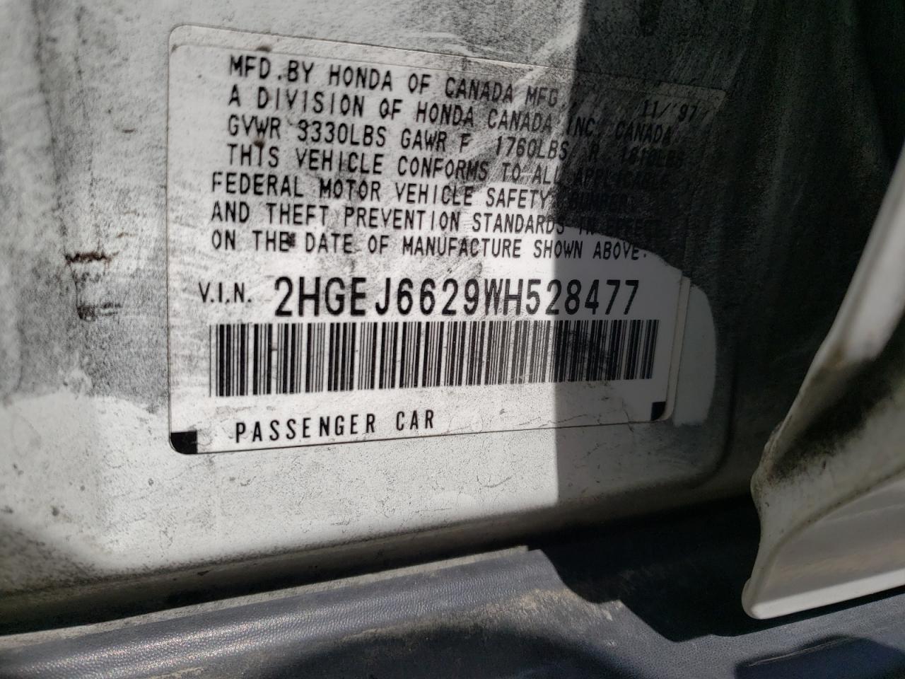 Photo 10 from auction – 1998 HONDA CIVIC DX with VIN 2HGEJ6629WH528477