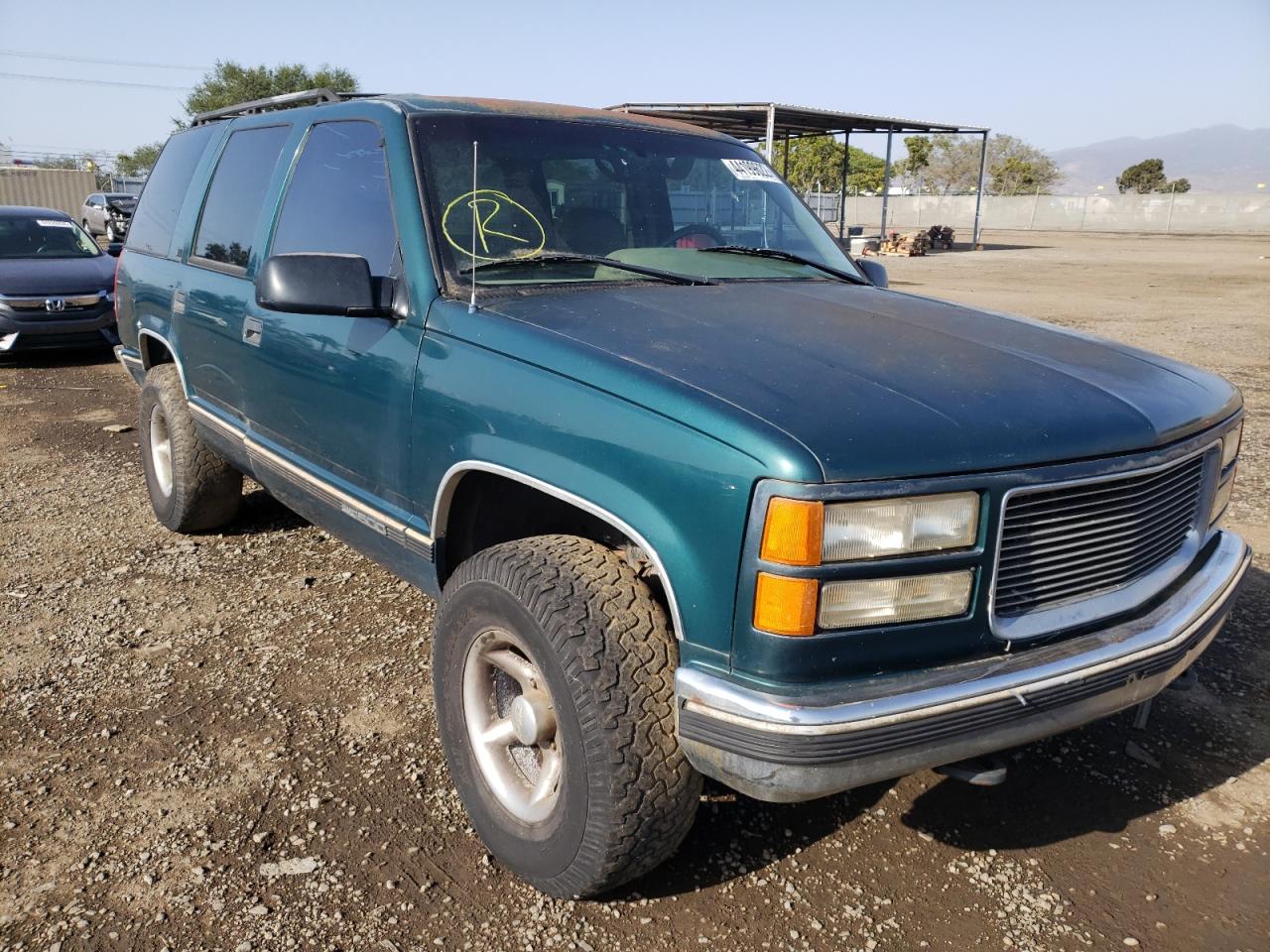 GMC YUKON 1996 with VIN 1GKEK13RXTJ706976 - Photo from auction