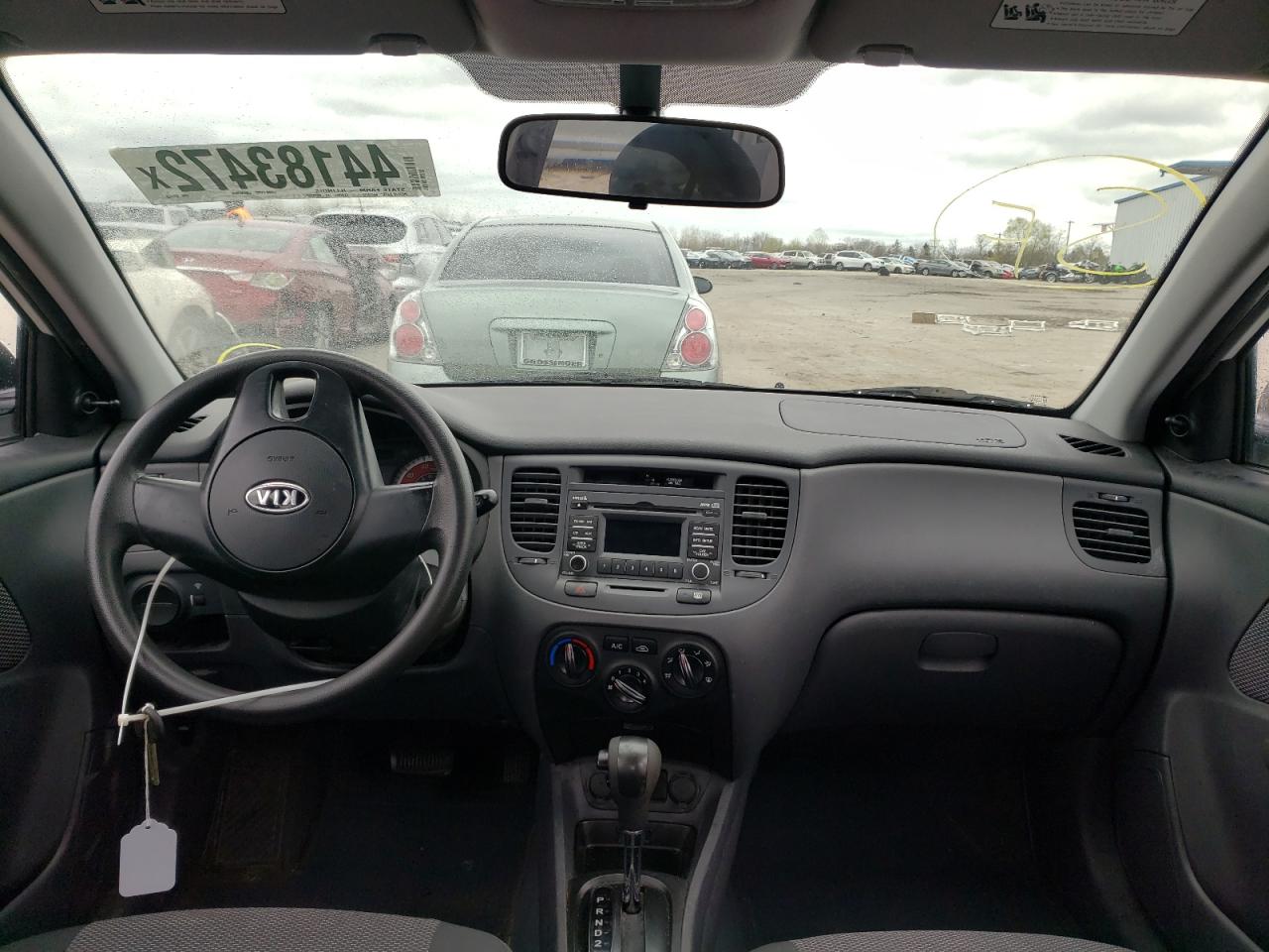 Photo 9 from auction – 2011 KIA RIO BASE with VIN KNADH4A38B6948458