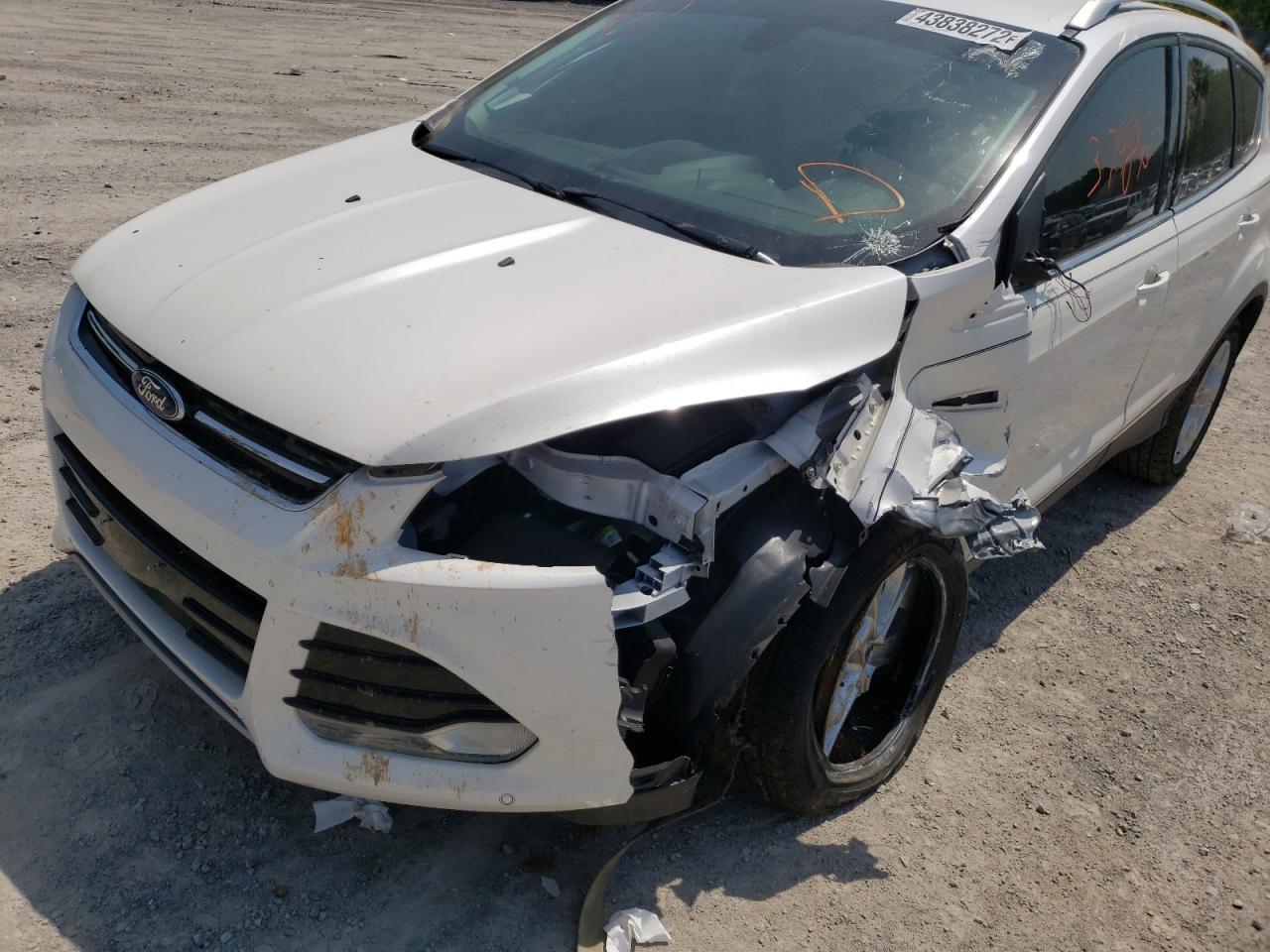 Photo 9 from auction – 2014 FORD ESCAPE TIT with VIN 1FMCU9J95EUA73637