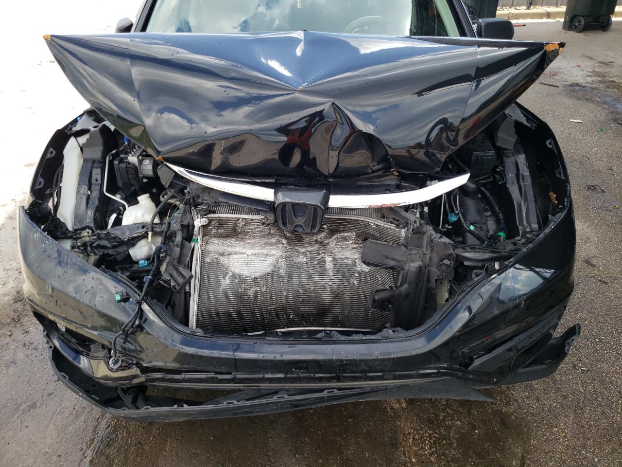 Photo 7 from auction – 2016 HONDA CR-V LX with VIN 2HKRM3H36GH554765