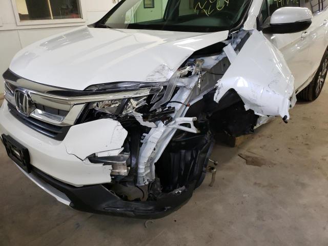 Photo 9 from auction – 2021 HONDA PILOT EXL with VIN 5FNYF6H5XMB084811