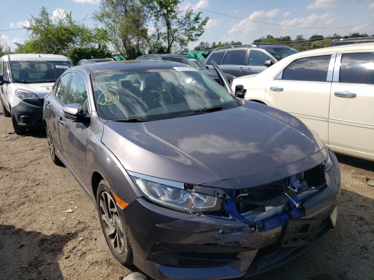 HONDA CIVIC EX 2017 with VIN 2HGFC2F79HH574722 - Photo from auction