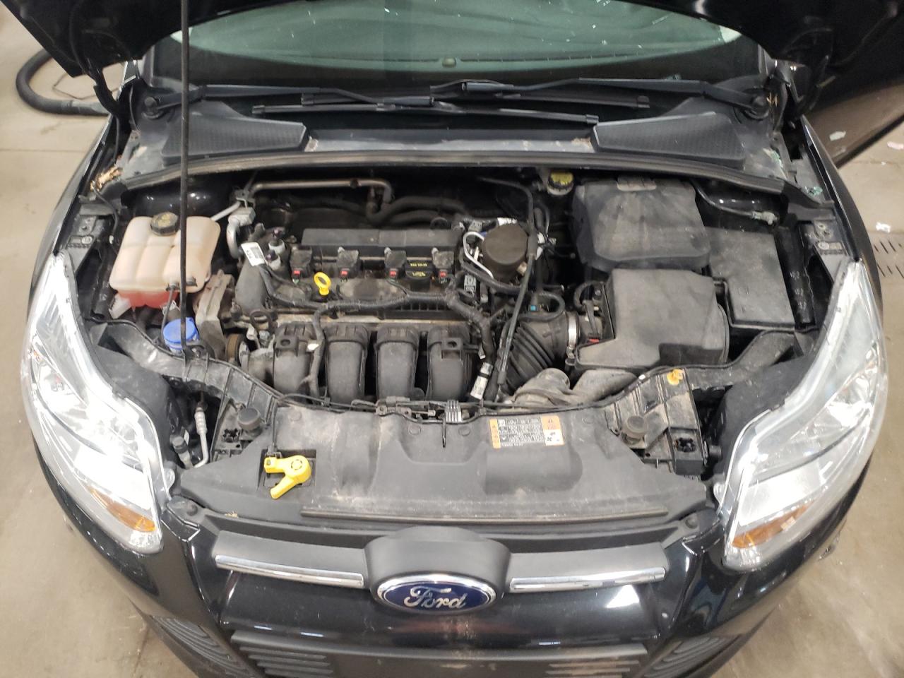 Photo 7 from auction – 2014 FORD FOCUS SE with VIN 1FADP3F28EL347689