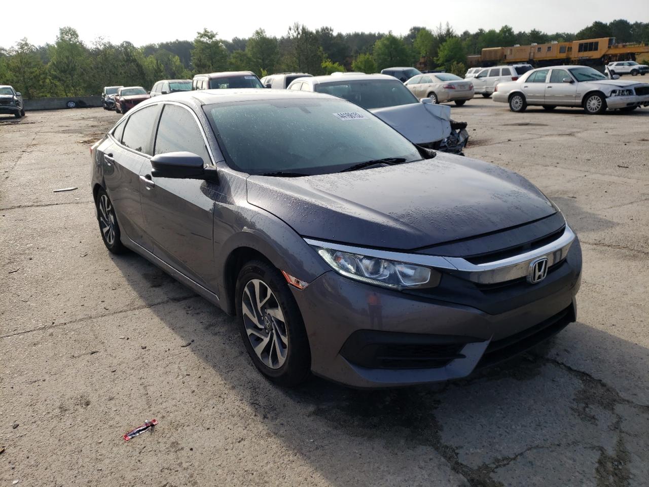 HONDA CIVIC EX 2018 with VIN 2HGFC2F75JH551511 - Photo from auction