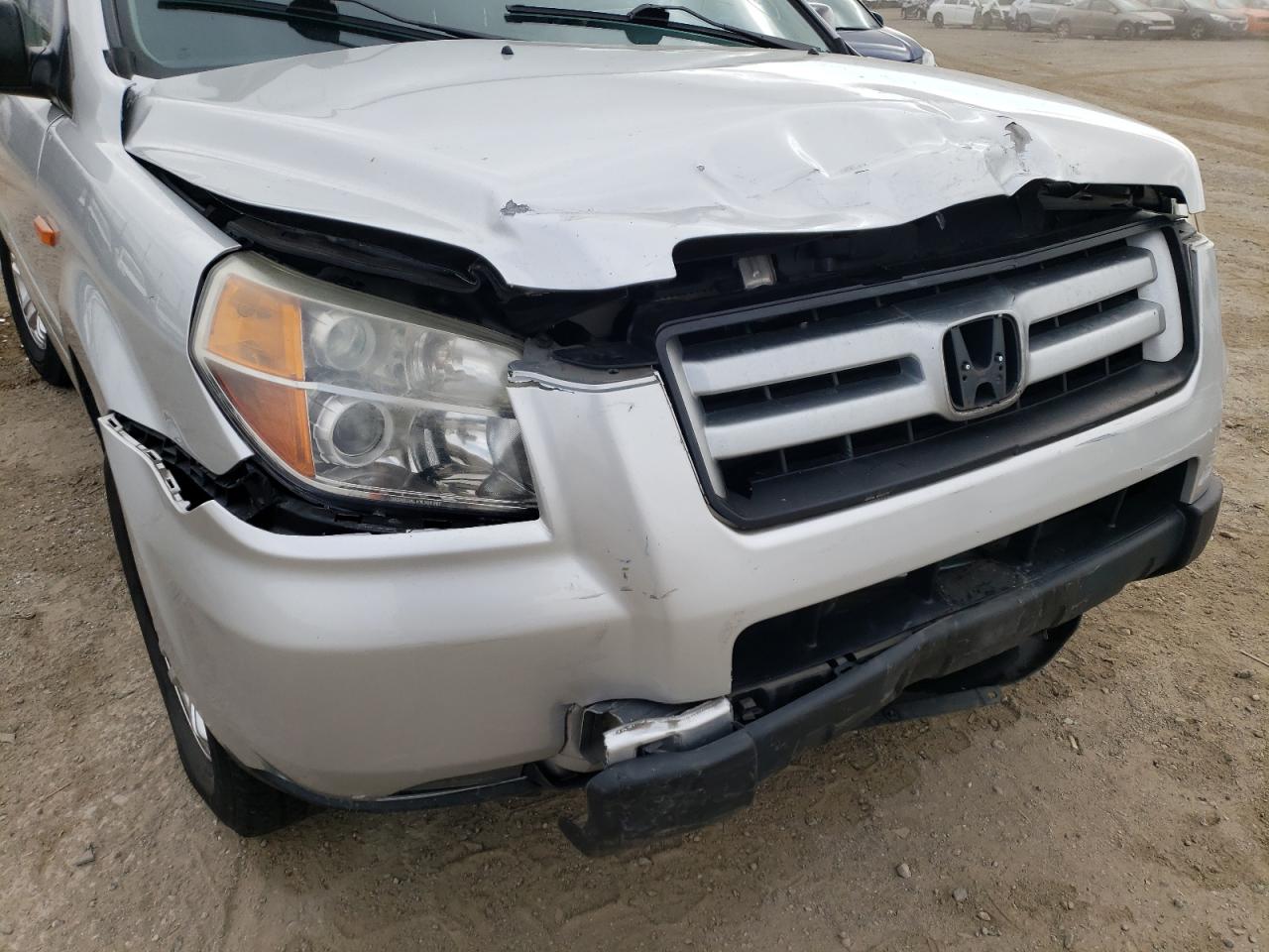 Photo 9 from auction – 2007 HONDA PILOT LX with VIN 5FNYF28197B038400