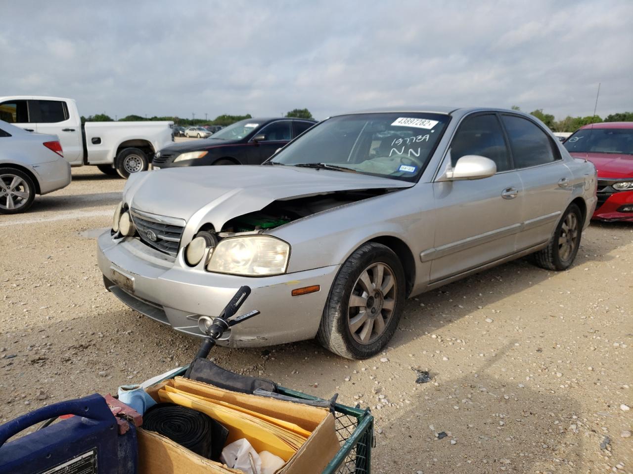 Photo 2 from auction – 2005 KIA OPTIMA LX with VIN KNAGD128955384623