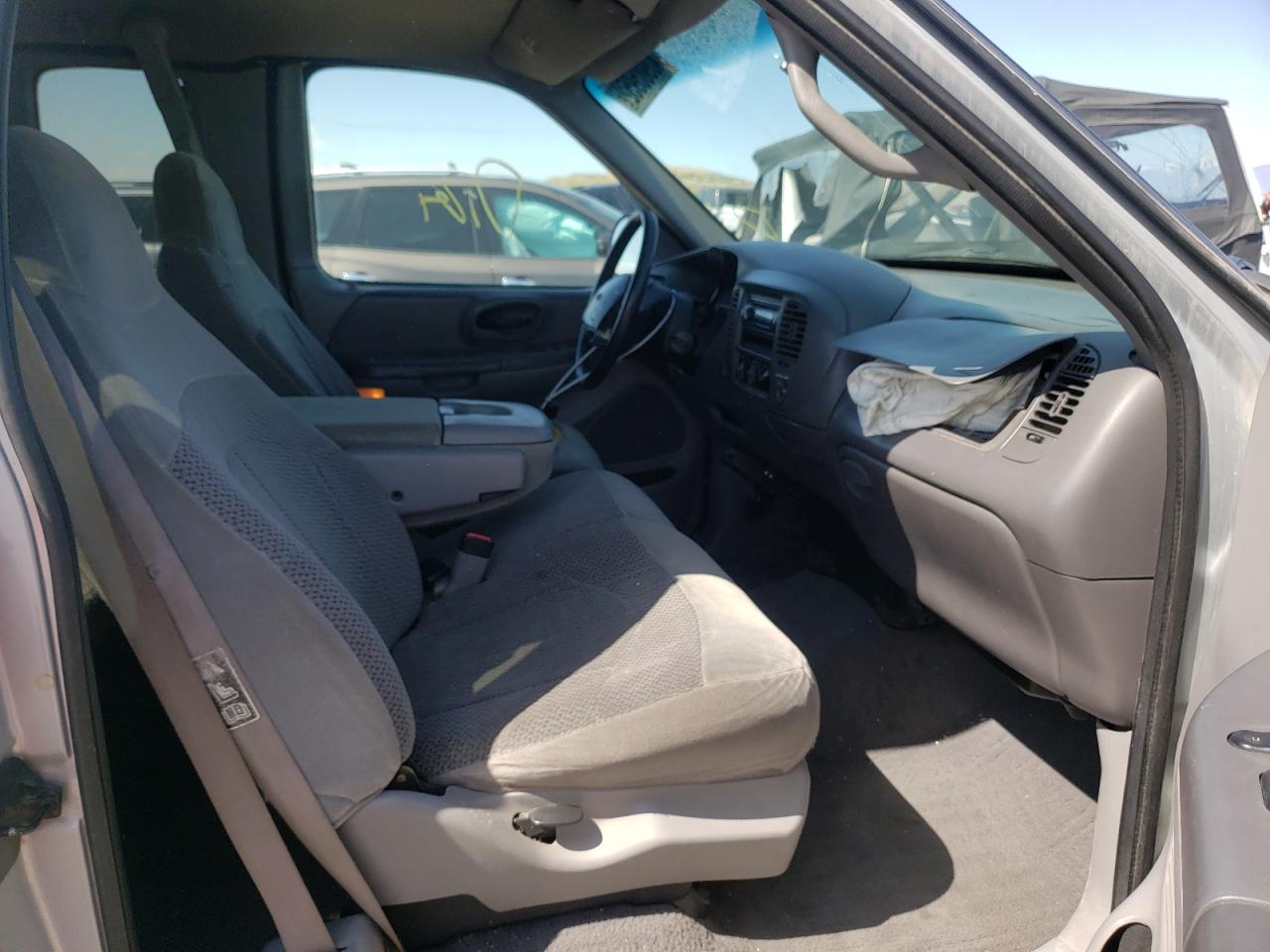 Photo 5 from auction – 1999 FORD F150 with VIN 1FTRX18W3XKA04804