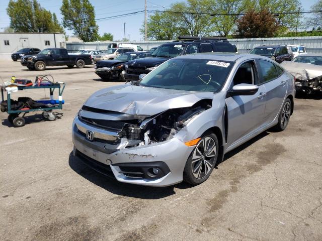 Photo 2 from auction – 2016 HONDA CIVIC EXL with VIN 19XFC1F74GE028221