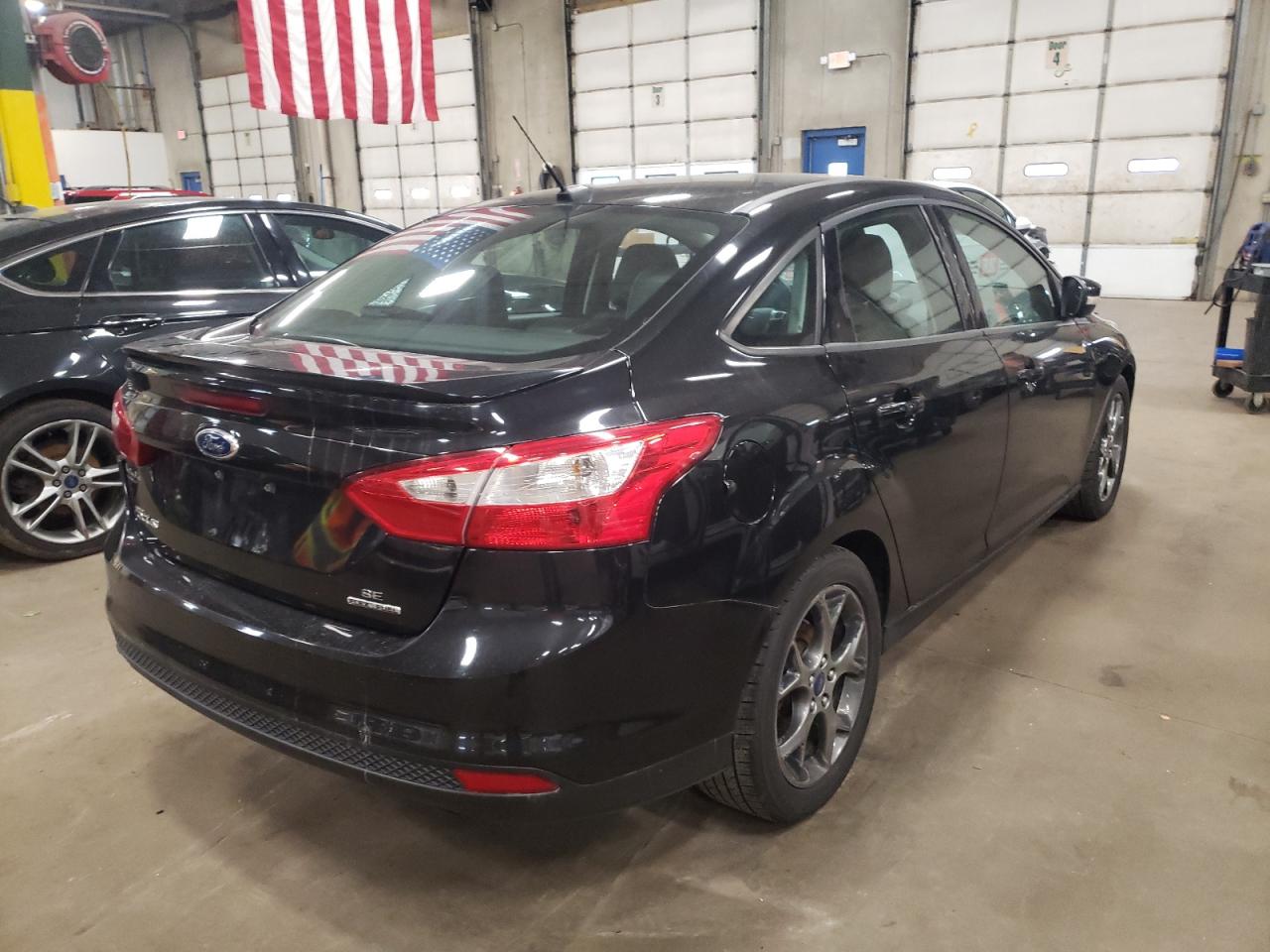 Photo 4 from auction – 2014 FORD FOCUS SE with VIN 1FADP3F28EL347689