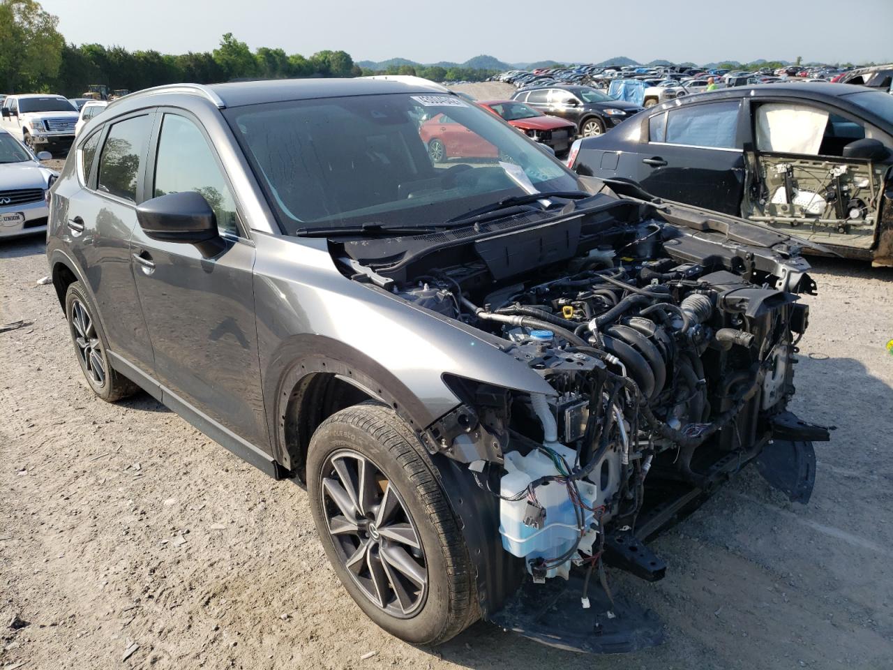 MAZDA CX-5 TOURI 2018 with VIN JM3KFACM3J0427337 - Photo from auction
