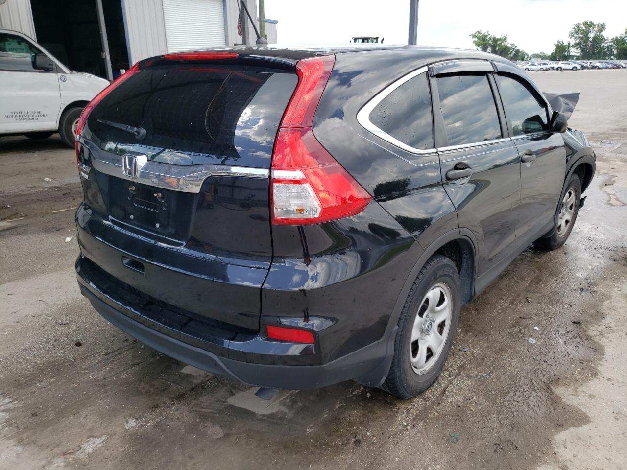 Photo 4 from auction – 2016 HONDA CR-V LX with VIN 2HKRM3H36GH554765