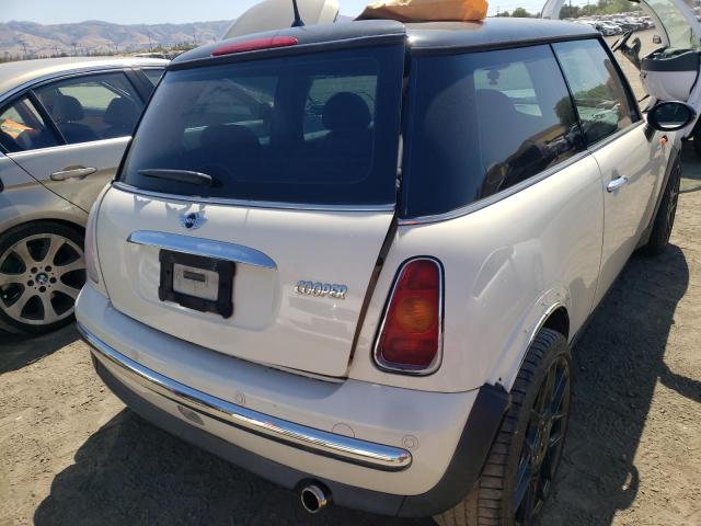 Photo 9 from auction – 2004 MINI COOPER with VIN WMWRC33444TJ62679