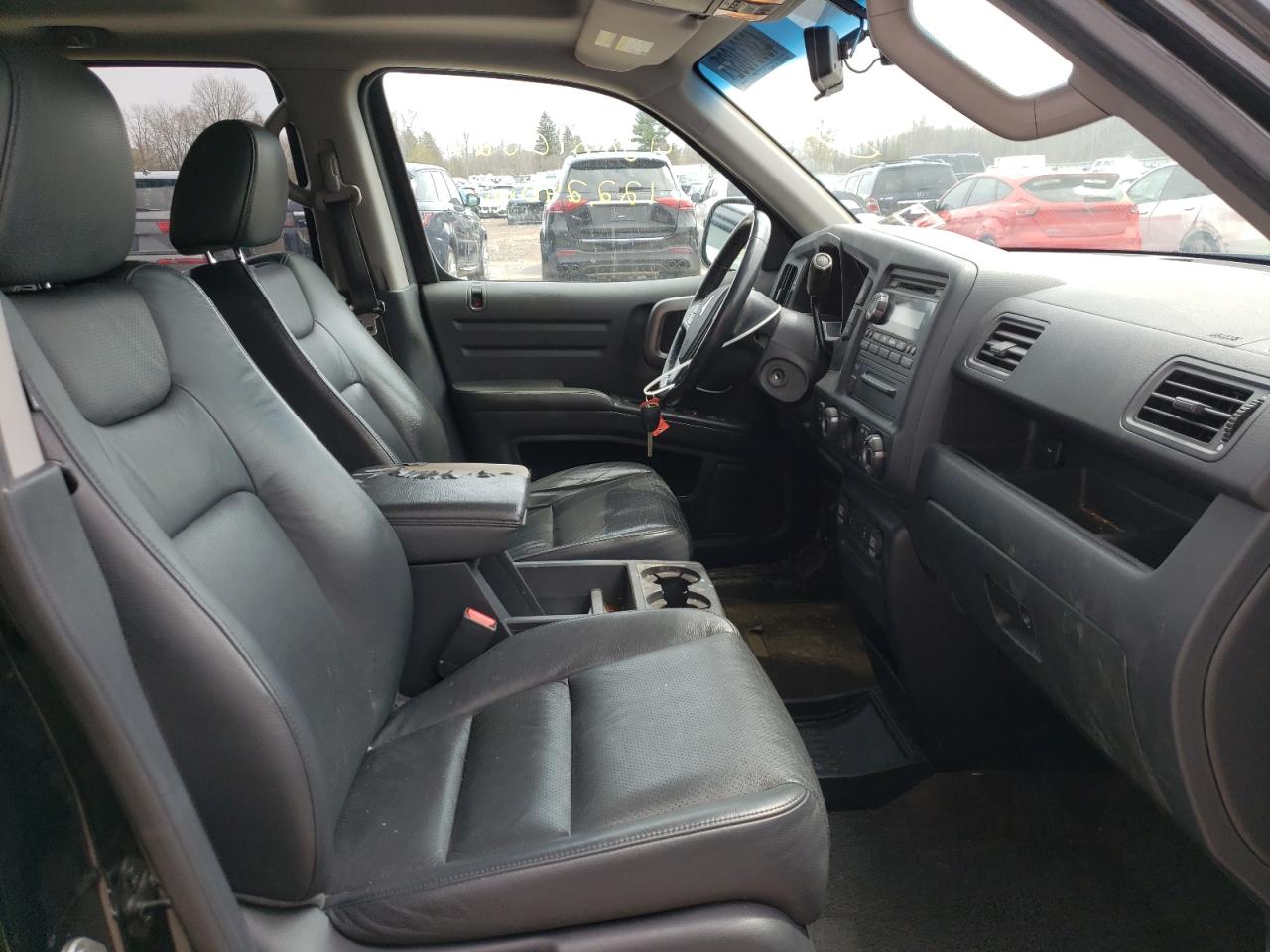 Photo 5 from auction – 2012 HONDA RIDGELINE with VIN 5FPYK1F55CB457891