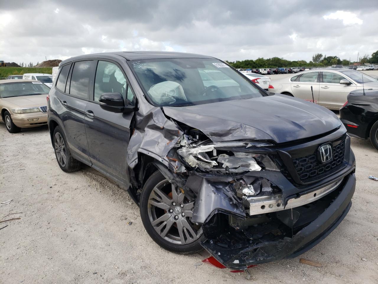 HONDA PASSPORT E 2021 with VIN 5FNYF7H5XMB013078 - Photo from auction
